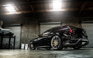 Black sports car garage man - a garage free wallpaper