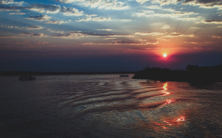 Sunset water boats clouds river - river free wallpaper for desktop