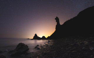 Rocky beach star filled sky - a rocky beach free wallpaper