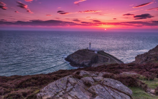 Lighthouse rocky cliff ocean sunset 11 - anna findlay free wallpaper