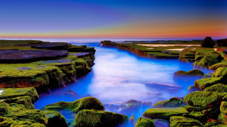 River beach sunset rainbow nature - a rainbow in the sky free wallpaper