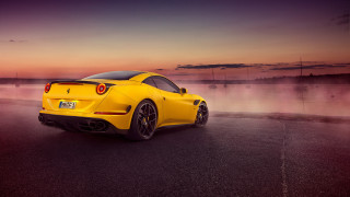 Yellow sports car water sunset - a pink sky free wallpaper for desktop
