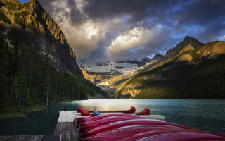 Red canoes mountain lake sunset - a dock next free wallpaper