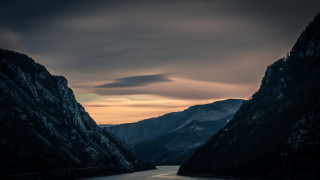 River mountains sunset cloudy sky - mountain under a cloudy sky free wallpaper