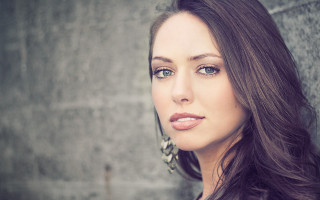 Woman long hair earrings wall 2 - a grey background free wallpaper