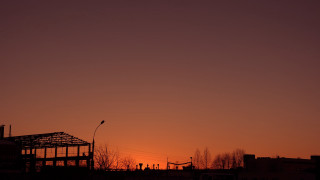Building sunset streetlight constructivism cityscape - a building in the foreground free wallpaper
