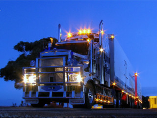 Large semi truck parking road - a large semi truck free wallpaper