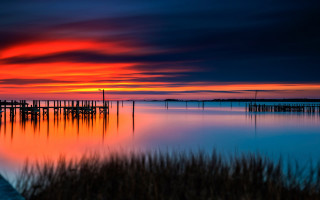 Sunset over water dock mystical - mystical color free wallpaper