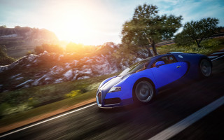 Blue sports car mountains forest - duccio free wallpaper