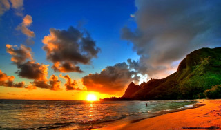 Sunset beach mountain clouds person - arthur quartley free wallpaper