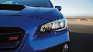 Blue car road sky desert - a blue car free wallpaper