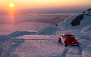 Toy car sunset snow tiltshift - a toy car free wallpaper