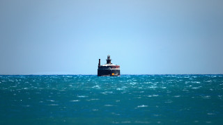 Boat ocean sunny blue sky - a boat floating free wallpaper