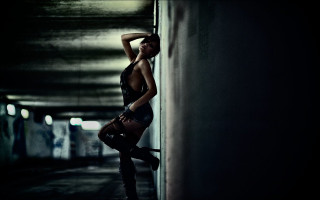 Woman black top boots leaning - black boot free wallpaper