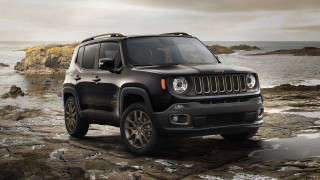 Black jeep rocky beach ocean 2 - a gray sky in the background free wallpaper