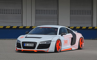 White car orange rims blue - a blue wall free wallpaper