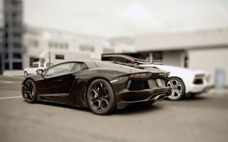 Black sports car parking lot 24 - a white car free wallpaper