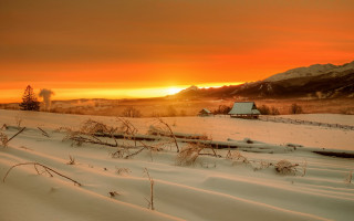 Snowy field barn mountains sunset - a snowy field free wallpaper