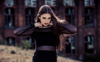 Woman longhair building sign fashion - a sign free wallpaper