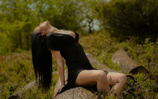 Gothic black dress sitting on - long black hair free wallpaper