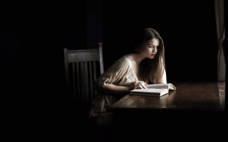 Woman reading dark room open - in the dark free wallpaper