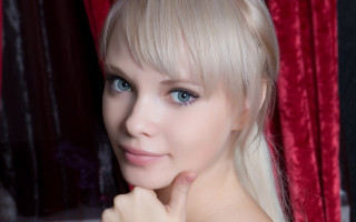 Elina karimova blonde blue eyes 7 - a red curtain behind her free wallpaper