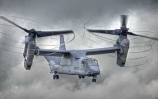 Military helicopter cloudy sky propellers 2 - eric peterson free wallpaper