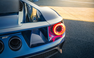 Sportscar taillight street person car - a car in the background free wallpaper