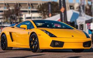 Yellow sports car parking lot 17 - a parking lot next free wallpaper for desktop