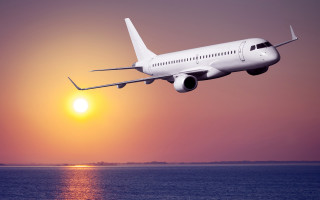 White airplane ocean sunset moon - over the ocean free wallpaper