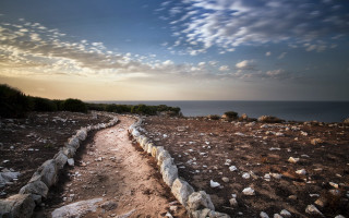 Rocky beach ocean cloudy sky - exekia free wallpaper