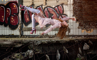 Woman skateboard trick graffiti surrealist - a ledge in front free wallpaper