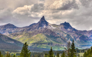Mountain range forest lake sunset 6 - a cloudy sky in the background free wallpaper