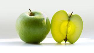 Green apple sliced conceptual product - a green apple free wallpaper