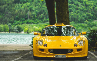 Yellow sports car parking lot 27 - adam szentpétery free wallpaper