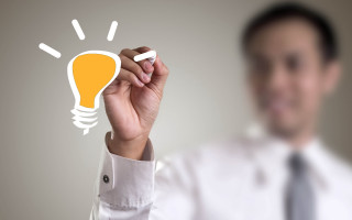 Man white shirt drawing lightbulb - a light bulb free wallpaper