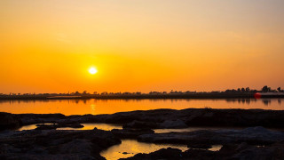 Sunset water rocks boat buoy - anne rigney free wallpaper
