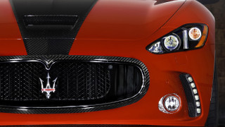 Maserati grille headlights brickwall neoclassicism - a brick wall in the background free wallpaper