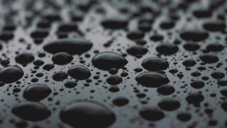 Water droplets black gray bw - a surface free wallpaper