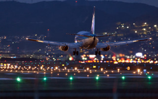 Jetliner night cityscape lights starry - a large jetliner free wallpaper