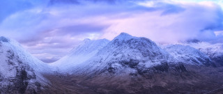 Snowy mountain range cloudy sky 6 - a few snow covered mountains free wallpaper