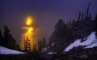 Foggy mountain lake trees bright - a bright light in the distance free wallpaper