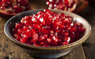 Pomegranate bowl wooden table closeup - boetius adamsz bolswert free wallpaper