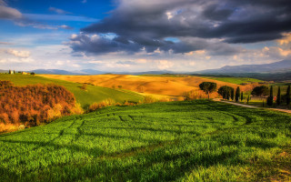 Green field road clouds mountains - synthetism free wallpaper