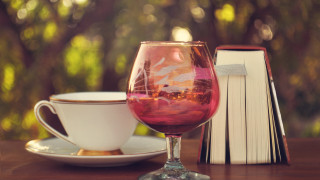 Wine book coffee saucer stilllife - a cup of coffee and a book free wallpaper
