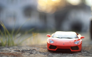 Toy car dirt bottle plant - tilt shift free wallpaper