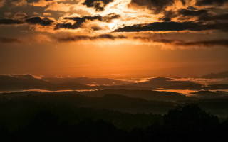 Sunset clouds mountains bird horizon - the background and a bird free wallpaper