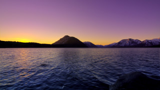 Mountain range sunset lake purple - a mountain range in the distance free wallpaper
