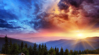Sunset mountain range tent foreground - crepuscular ray free wallpaper