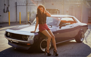Woman car park fence fashion - a car in a parking lot free wallpaper